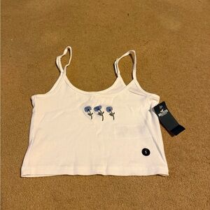 Hollister white cropped ribbed tank with blue flowers on front